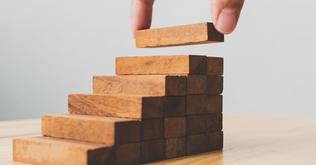 Wooden blocks stacked as rising steps